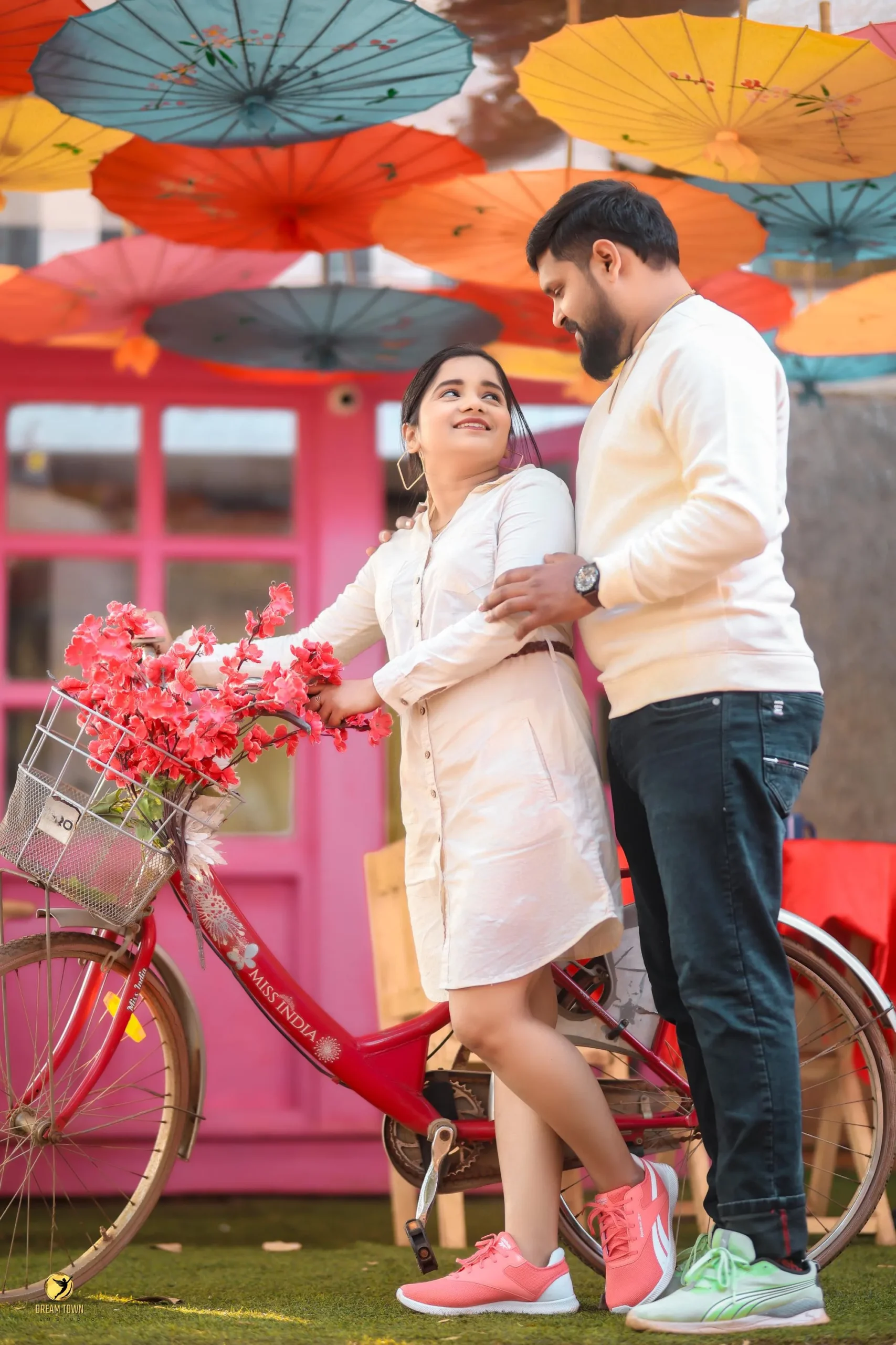 Romantic pre-wedding candid moment at photography studio in Pune