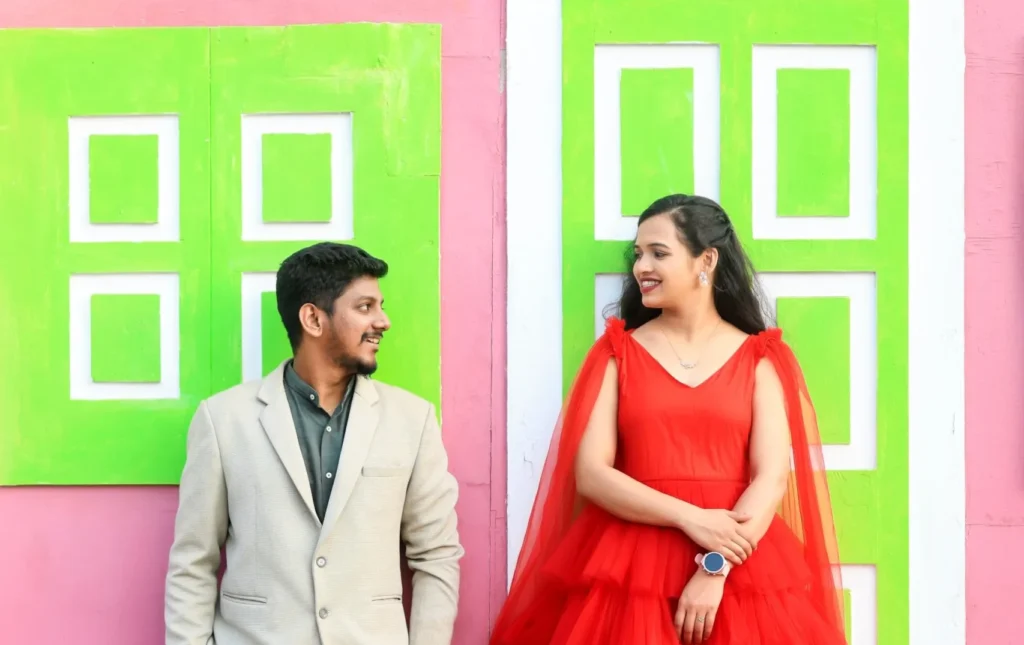 Bride in lehenga and groom in sherwani posing at Dream Town Film Studio