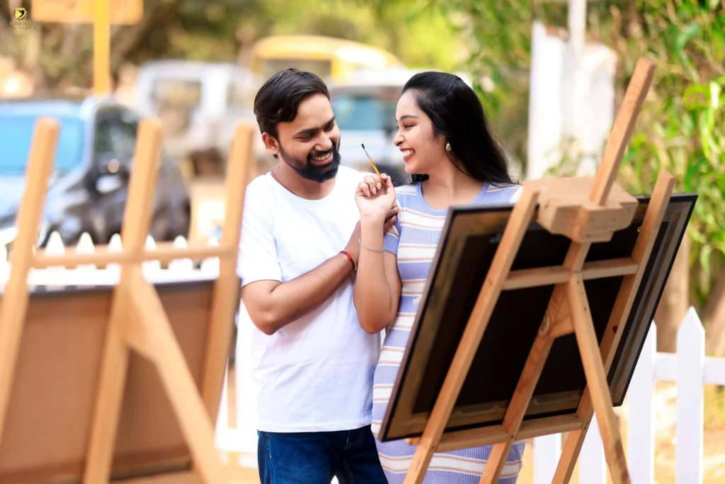 Romantic pre-wedding candid moment at photography studio in Pune