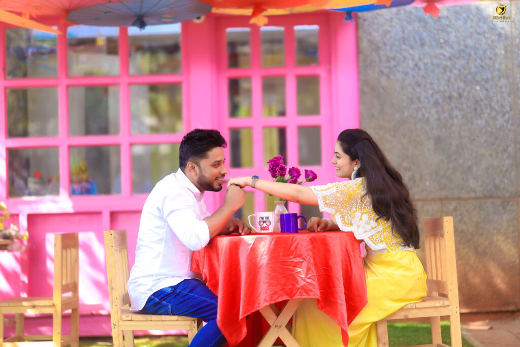 Romantic pre-wedding candid moment at photography studio in Pune