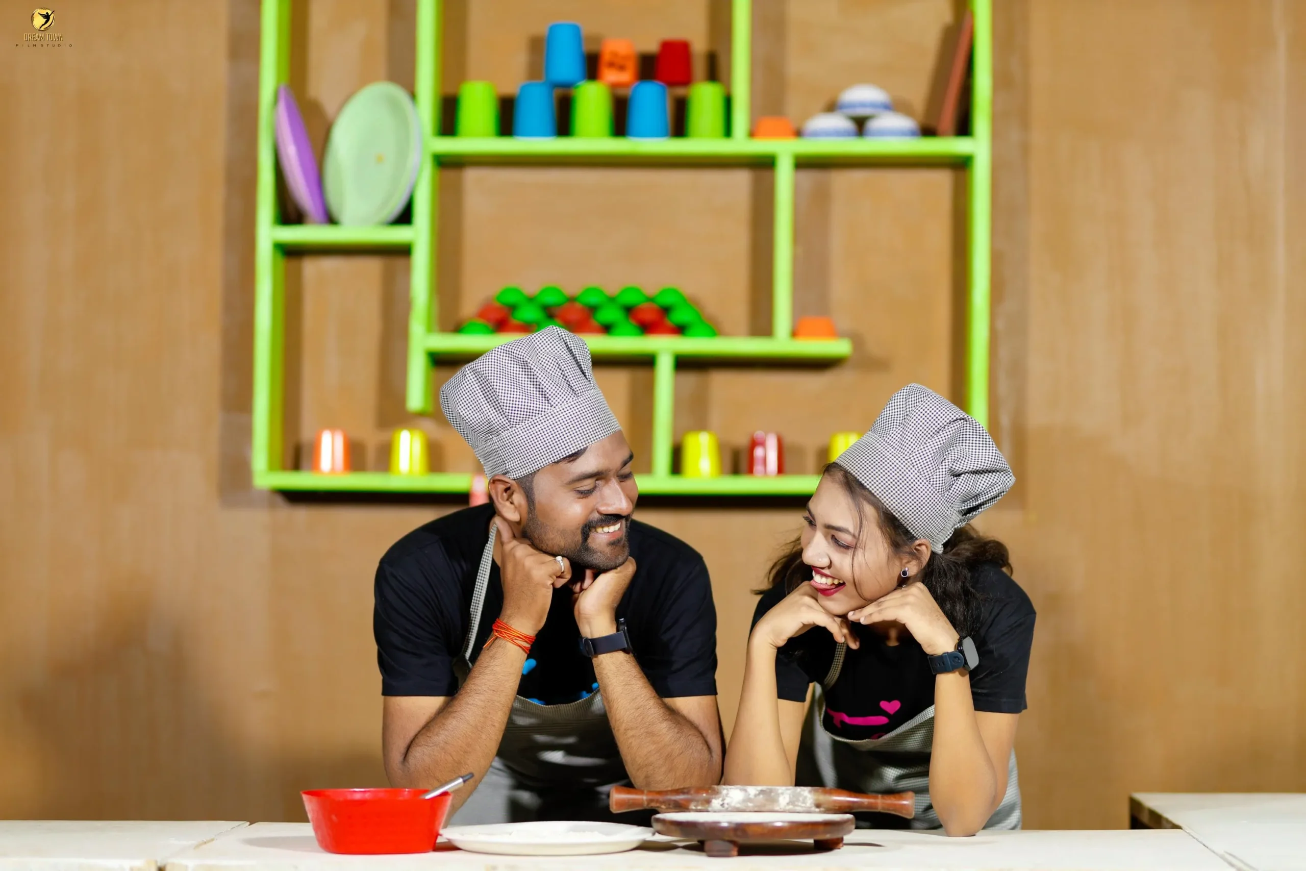 Romantic pre-wedding candid moment at photography studio in Pune